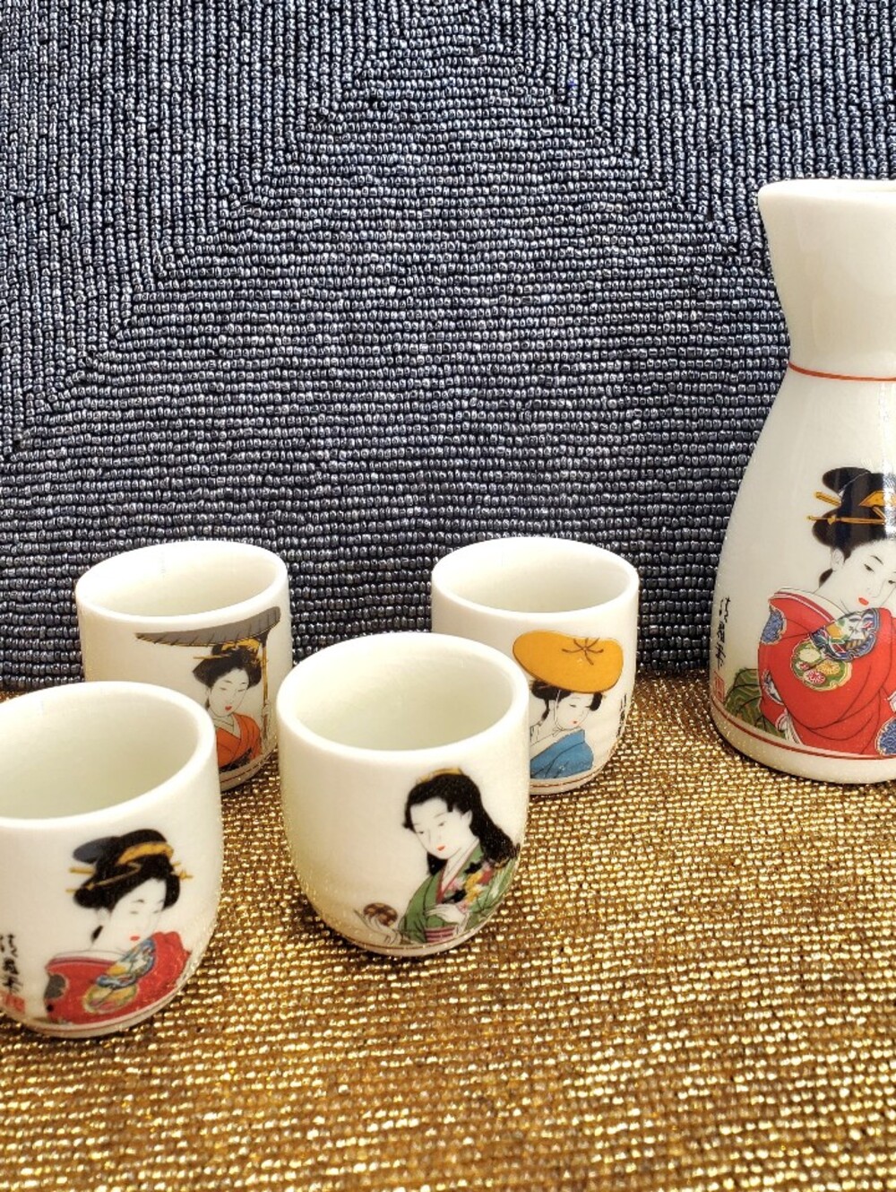 Traditional Japanese Geisha Porcelain Sake Set including one tokkuri  & 4 ochoko